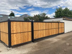 Outside view of finished gate and fence installation.