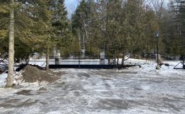 Double cantilever gates that meet in the center of the driveway