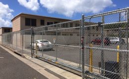 apartment parking lot with sliding gate