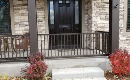 closed sliding gate on porch