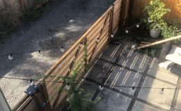View of gate from 2nd story of home