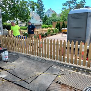 fully closed sliding gate with wood pickets