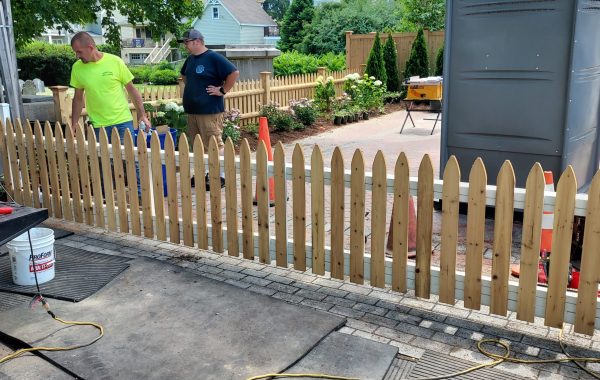 Residential wood on steel picket gate with an All-O-Matic SL100DC operator.