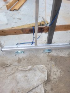 Close up of carriages inside aluminum track