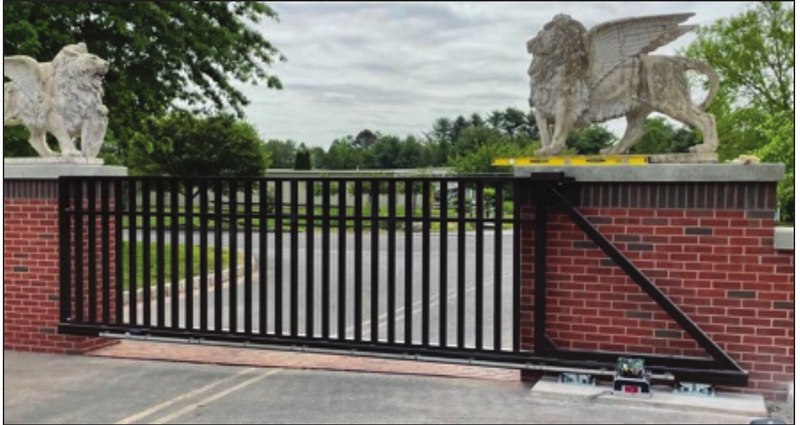 Photo of a cantilever gate with a single typical diagonal brace in the tail section
